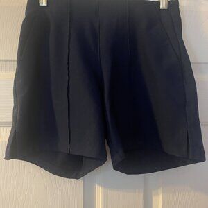 Navy blue Adidas shorts. w side slits and front and back pockets - size XS